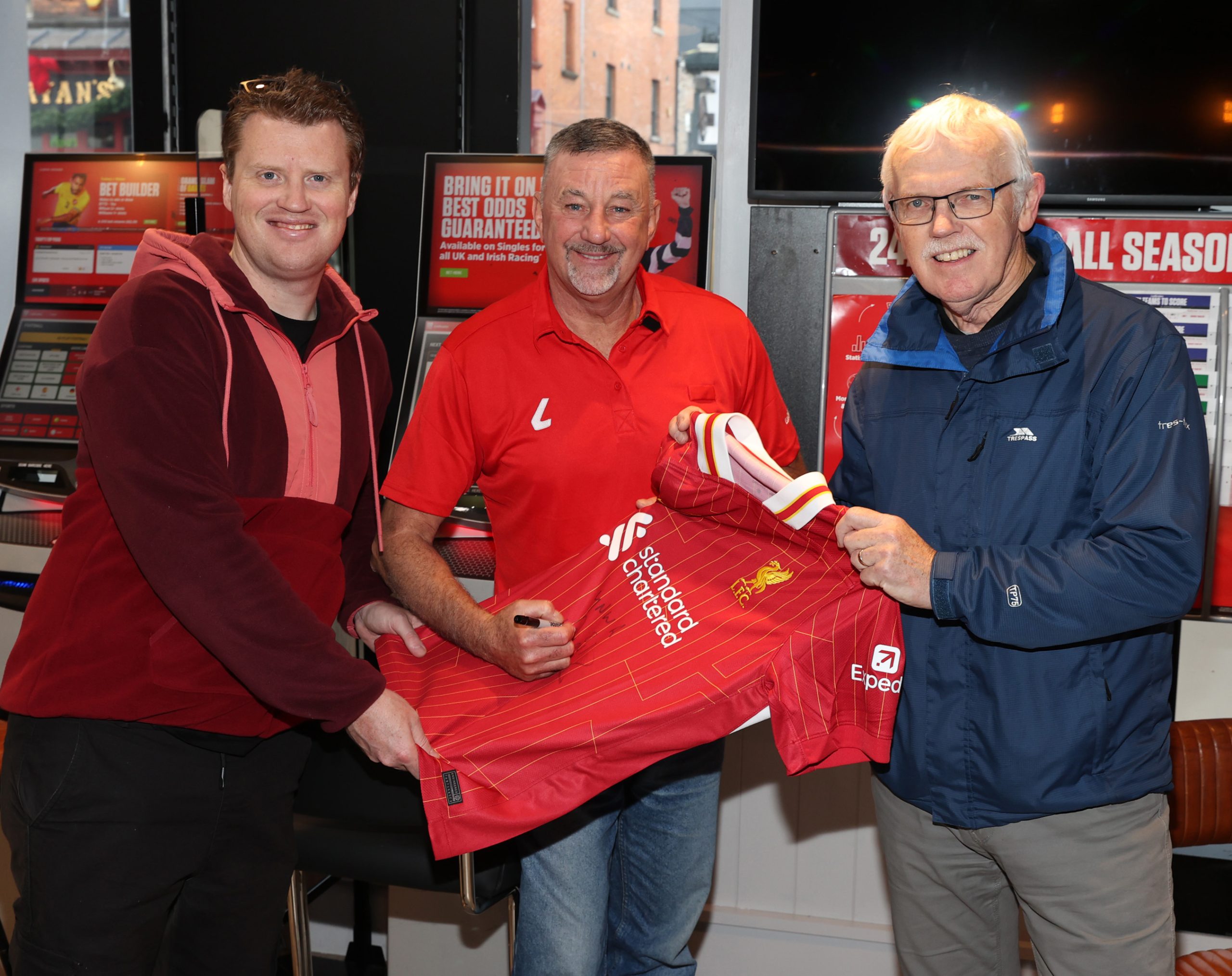 Liverpool FC and Ireland legend John Aldridge surprised two lucky customers with all expenses paid trip to Anfield Stadium